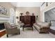 Open-concept living room featuring a fireplace, soaring ceilings and lots of natural light at 7126 Nile Ridge Ct, Indianapolis, IN 46236