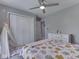 Bright bedroom features closet, ceiling fan, play tent, dresser and floral bedding, perfect for a  at 7203 Sycamore Run Dr, Indianapolis, IN 46237
