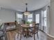 Charming dining area with natural light, perfect for casual meals and entertaining at 7203 Sycamore Run Dr, Indianapolis, IN 46237