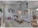 Bright, open-concept living room with high ceilings and access to the upper level at 7203 Sycamore Run Dr, Indianapolis, IN 46237
