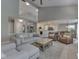 Open-concept living room leads to the kitchen and dining areas, perfect for entertaining at 7203 Sycamore Run Dr, Indianapolis, IN 46237