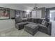 This lower level theater room includes a sectional sofa with pull out bed, Star Wars decor, and access to additional storage at 7203 Sycamore Run Dr, Indianapolis, IN 46237