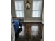 Bedroom featuring beautiful hardwood floors and natural light from two windows at 725 E New York E St, Indianapolis, IN 46202