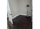 Empty bedroom with pristine hardwood floors and neutral walls at 725 E New York E St, Indianapolis, IN 46202