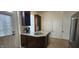 Well-equipped kitchen with stainless appliances and a convenient island at 725 E New York E St, Indianapolis, IN 46202