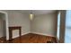 Living room with hardwood floors, fireplace, and decorative chandelier at 725 E New York E St, Indianapolis, IN 46202