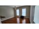 Bright living room with hardwood floors, natural light, and chandelier at 725 E New York E St, Indianapolis, IN 46202