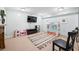 Finished basement rec room featuring a tv, play area and neutral carpeting at 7319 Hartington Pl, Indianapolis, IN 46259