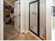 The bathroom features a glass shower, a view of a closet, and tile flooring at 755 Canberra Blvd, Westfield, IN 46074