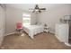 Bedroom with neutral walls, carpet, and a ceiling fan near a bright sunny window at 755 Canberra Blvd, Westfield, IN 46074