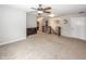 Upstairs bonus room with neutral carpet leading to bedrooms, bathrooms, and the staircase at 755 Canberra Blvd, Westfield, IN 46074