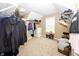 Spacious walk-in closet with shelving and ample storage for clothes and accessories at 755 Canberra Blvd, Westfield, IN 46074