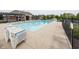 Community pool with outdoor lounge chairs at 755 Canberra Blvd, Westfield, IN 46074