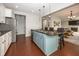 Contemporary kitchen with granite island and barstool seating that opens to the living and dining rooms at 755 Canberra Blvd, Westfield, IN 46074