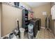 Fully equipped laundry room with modern washer, dryer, shelving, and storage solutions at 755 Canberra Blvd, Westfield, IN 46074