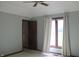 A bedroom with neutral walls and curtains, door open to hall, and carpeted floors at 7622 Eaker Ct, Brownsburg, IN 46112