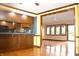 View of kitchen and a sun room with lots of windows at 7622 Eaker Ct, Brownsburg, IN 46112