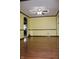 Spacious living room featuring hardwood floors and ample natural light at 7622 Eaker Ct, Brownsburg, IN 46112