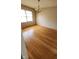Dining room featuring hardwood floors, a chandelier and natural light from a window at 7629 Walton Dr, Indianapolis, IN 46214