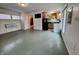 Open-concept living room, kitchen and dining area with modern appliances, tile floors and neutral paint at 8277 N Lasalle Rd, Morgantown, IN 46160