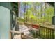 Outdoor porch and railings with wooded scenery at 8277 N Lasalle Rd, Morgantown, IN 46160