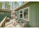 Outdoor deck with seating and view of nature at 8277 N Lasalle Rd, Morgantown, IN 46160