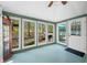 Bright and airy sun room featuring plenty of natural light and backyard views creating a peaceful and relaxing space at 8277 N Lasalle Rd, Morgantown, IN 46160