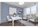 Dining room with a modern table, chairs, decorative shiplap wall and hardwood floors at 8436 Paxton Dr, Brownsburg, IN 46112