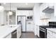 Modern kitchen with stainless steel appliances, a center island, and ample countertop space at 8436 Paxton Dr, Brownsburg, IN 46112