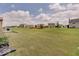 Expansive backyard showcasing a well-maintained lawn in a quiet residential neighborhood at 845 Blackberry Dr, Greenwood, IN 46143
