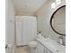 The bathroom contains a white vanity and a modern round mirror at 845 Blackberry Dr, Greenwood, IN 46143