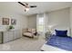 The bedroom has neutral paint, a ceiling fan, and a view from the window at 845 Blackberry Dr, Greenwood, IN 46143