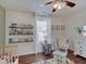 The Bedroom has an accent wall, a ceiling fan, and a view from the window at 845 Blackberry Dr, Greenwood, IN 46143