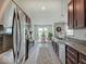 Charming kitchen features stainless steel appliances and a cozy eat-in area with natural light at 845 Blackberry Dr, Greenwood, IN 46143
