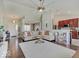 Spacious living room boasts hardwood floors, large windows, and an open layout great for entertaining at 845 Blackberry Dr, Greenwood, IN 46143