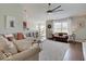 Spacious living room with plush seating, a large rug, and abundant natural light at 845 Blackberry Dr, Greenwood, IN 46143