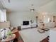 Bright living room featuring modern fan, hardwood floors, and stylish furnishings for comfortable living at 845 Blackberry Dr, Greenwood, IN 46143