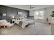 Spacious main bedroom with stylish accent wall, soft carpet, and ample natural light at 845 Blackberry Dr, Greenwood, IN 46143