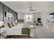 A main bedroom features an accent wall, a view from the window, and a modern ceiling fan at 845 Blackberry Dr, Greenwood, IN 46143
