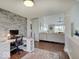 Stylish office area flowing into a comfortable living room with a cohesive design at 845 Blackberry Dr, Greenwood, IN 46143