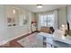 Bright office area with stylish desk, natural light, and views of the entryway at 845 Blackberry Dr, Greenwood, IN 46143