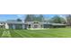 Expansive backyard with a lush lawn, perfect for outdoor activities and entertaining at 8604 W Tulip Tree Dr, Muncie, IN 47304