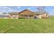 Expansive backyard featuring brick and wood exterior with mature landscaping at 9377 N 500 W, McCordsville, IN 46055