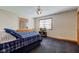 Large bedroom with ample space and natural light with carpet and ceiling fan at 9377 N 500 W, McCordsville, IN 46055