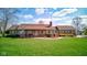 Charming brick home with welcoming porch and beautifully landscaped front yard at 9377 N 500 W, McCordsville, IN 46055