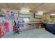 Well-lit garage with a large workbench, tool storage, and plenty of workspace at 9377 N 500 W, McCordsville, IN 46055