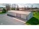 Exterior photo of a large outbuilding with drive-in garage door at 9377 N 500 W, McCordsville, IN 46055