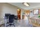 Tile-floored space functions as office, dining, and transition to other areas at 9377 N 500 W, McCordsville, IN 46055