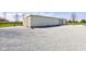 Exterior of a large outbuilding featuring a drive and sliding door at 9377 N 500 W, McCordsville, IN 46055
