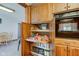 Spacious wooden pantry with pull-out shelves, offering ample storage in this well-organized kitchen at 9377 N 500 W, McCordsville, IN 46055